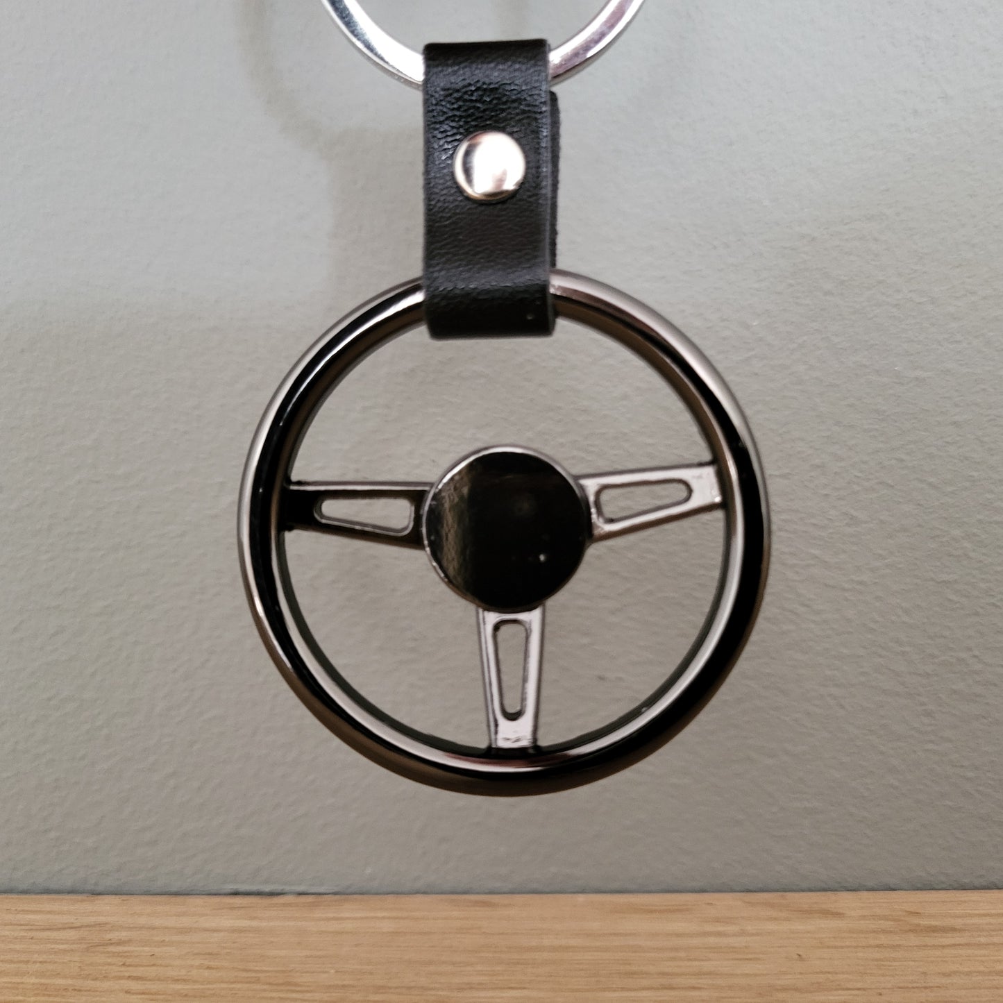 Carrera steering wheel keychain